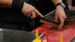 This image captures the precision and craft of a professional culinary environment.